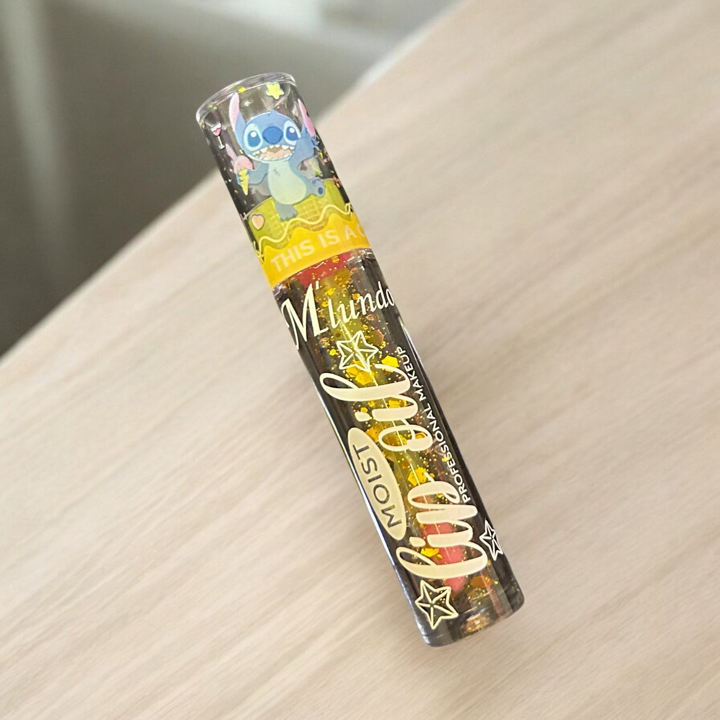 This is a cute animal Stitch Lip Oil M'lundo