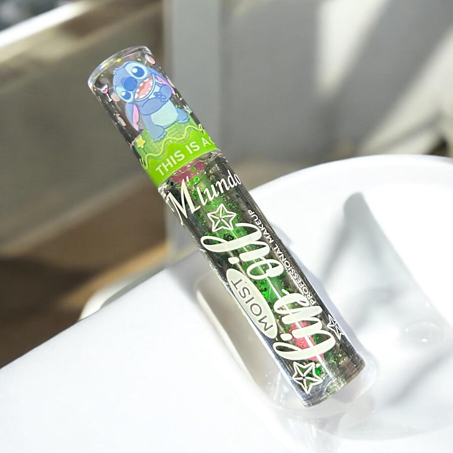 This is a cute animal Stitch Lip Oil M'lundo